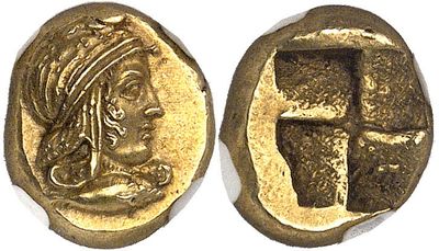 a gold coin with an image of a woman holding a cross