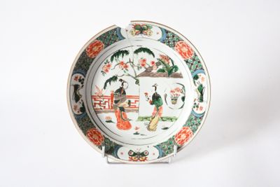a plate with a design on it on a white surface