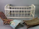 a baby crib and a rocking chair next to each other
