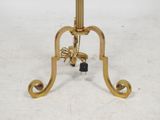 an image of a brass table with a glass top on a white surface