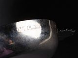 a silver spoon that is sitting on a table