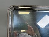 a man taking a picture of himself in a mirror