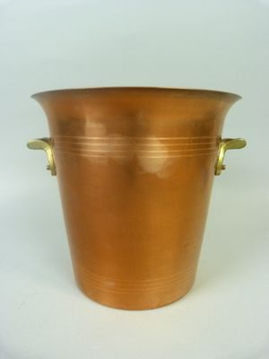 an image of a large copper pot with handles on a white background