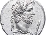 a close up of a silver coin with a man on it