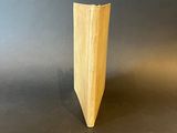 a small wooden object that is on a table