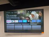 a large flat screen tv on the wall in the room