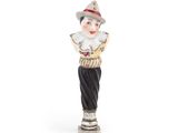 une figurine représentant un clown avec un chapeau et une chemise rayée
