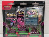 a close up of a box of pokemon cards on a white surface