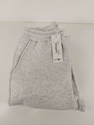 a close up of a pair of grey sweat pants with a tag on it