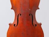 an old violin hanging from a string on a white background