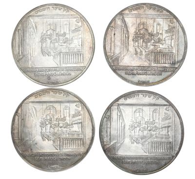 four silver coins with a drawing of a living room and a kitchen