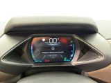 a digital display in the center of a car ' s dashboard