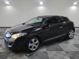 a picture of a black car parked in a garage
