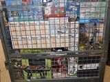 a cart full of magazines on the floor in a warehouse