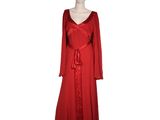 the dress is red and has long sleeves and a belt