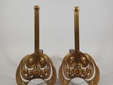 pair of antique brass candlesticks on wooden bases
