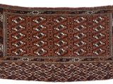 a close up of a brown and black rug on a white background