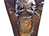 bronze statue of a woman with a crown on top of a vase