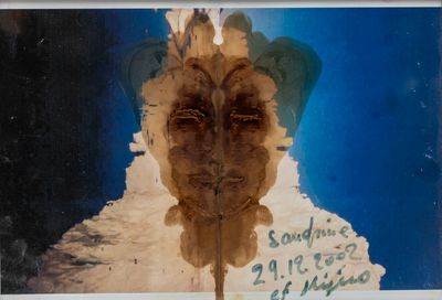 a picture of a picture of a face on a piece of paper