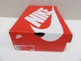 a red box that has a white nike logo on it