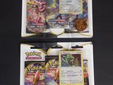 Une boîte contient deux paquets de cartes à collectionner Pokémon