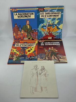 un tas de bandes dessinées posées sur une table blanche