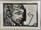 black and white photograph of a man with graffiti on his face