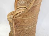 an image of a wicker chair on a white background