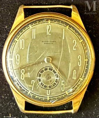 an image of a gold wrist watch with roman numerals on the face