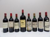 six bouteilles de vin sont alignées sur une table