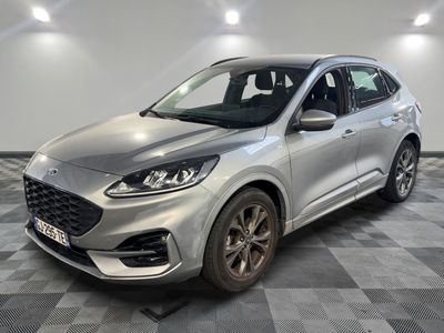 a silver ford escape is parked in a room with a checkered floor