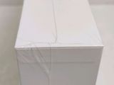 a close up of a white box on a table