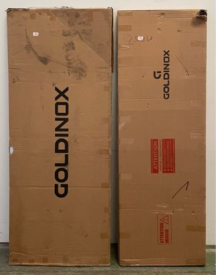 two boxes sitting next to each other on the floor