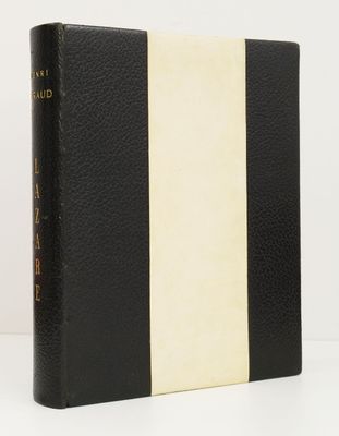 a close up of a black and white book on a table
