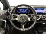 the interior of a car with a steering wheel, dashboard, and dash board