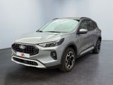 Une Ford Escape grise de 2020 est garée dans une grande pièce
