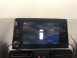 a picture of a car dashboard with a tablet on it