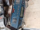 two power tools that are sitting on a table