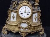 a clock that is sitting on top of a table