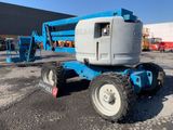 an image of a blue scissor parked in a parking lot