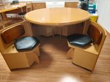 two chairs and a table in the corner of a room