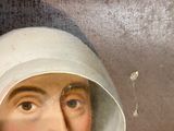 portrait of a woman in a nun ' s habit with a white hood