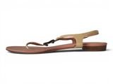 a picture of a pair of women ' s sandals on a white background