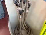 a box with a bunch of hoses inside of it