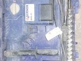 a blue tool box with tools in it on the floor
