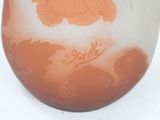 a vase that has a picture of a fish on it