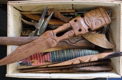 a wooden box filled with different types of tools