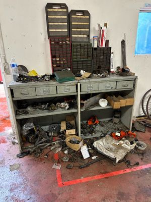 a workbench with a lot of tools on top of it