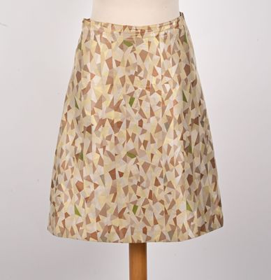 a mannequin with a skirt made out of a geometric pattern