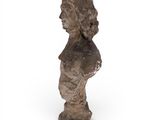 a statue of a woman ' s head is shown on a white background